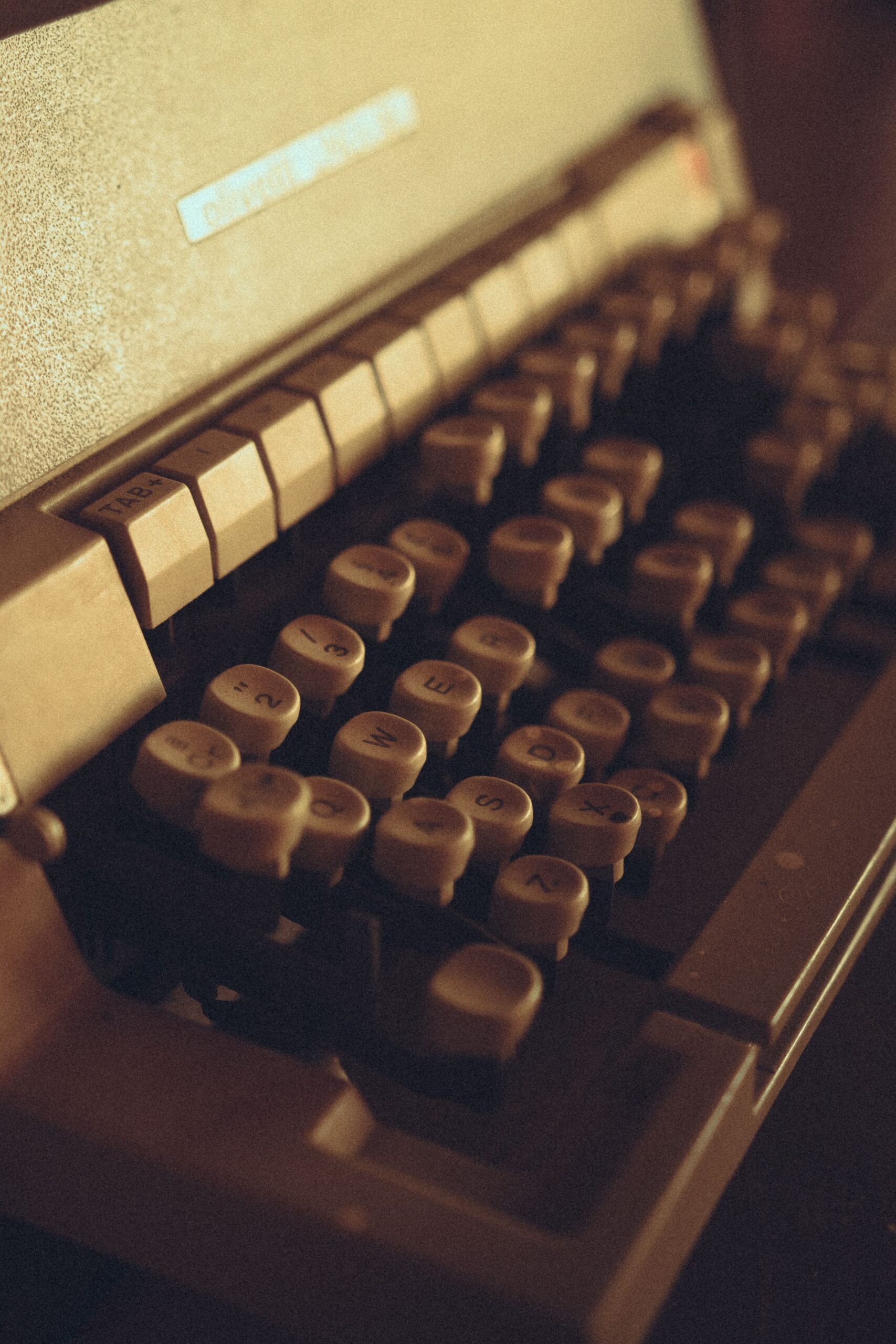 A vintage typewriter in sepia tones, emphasizing nostalgia and classic technology.